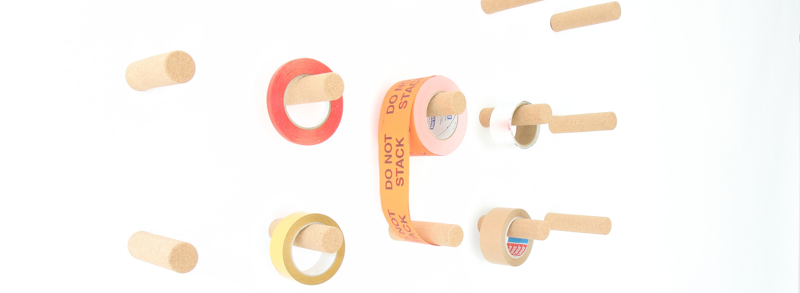 cork peg used as a tape hanger