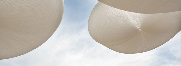 cloud softlight pendants against the blue sky - paper lighting / acoustic pendant lighting by molo