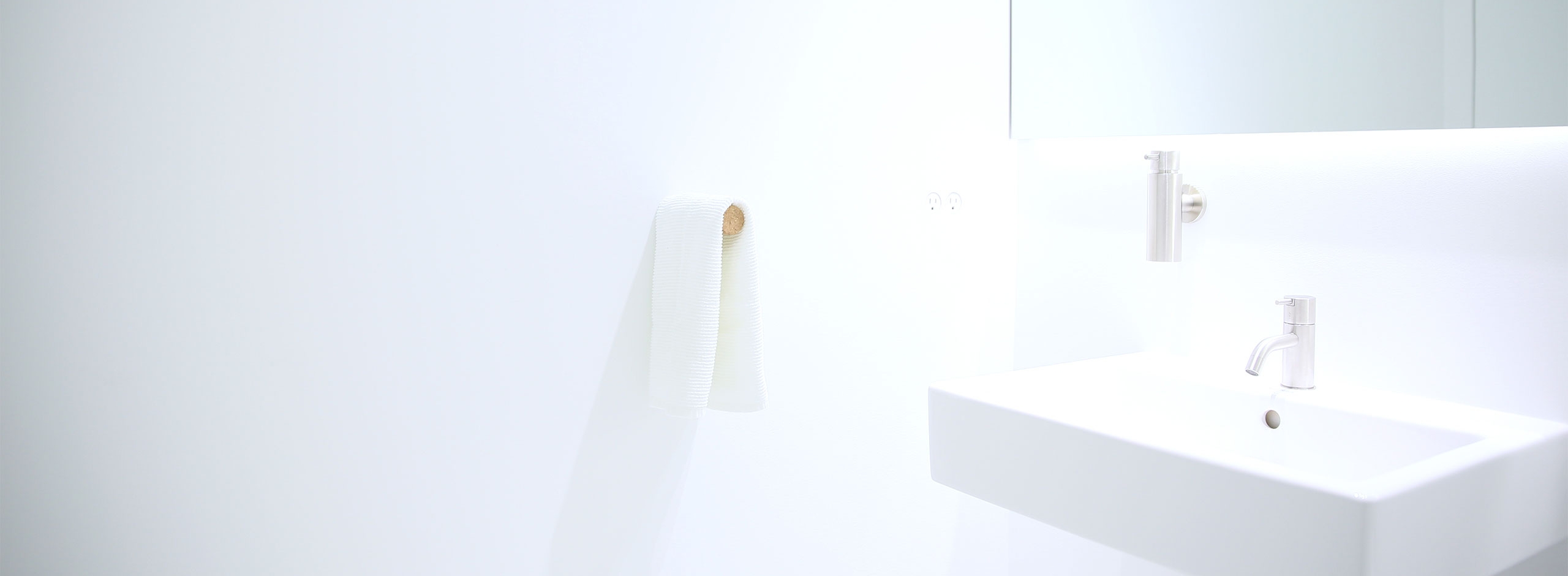 cork peg as a towel hanger in a modern bathroom