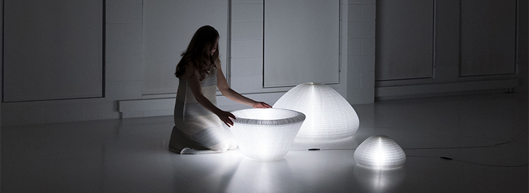 A paper lamp with shifting form, urchin softlight is designed by Stephanie Forsythe and Todd MacAllen for molo.