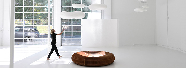 cloud lamp mobile with folding seating paper furniture below by molo.