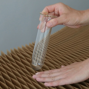 empty glass vase inserted into brown kraft softblocks
