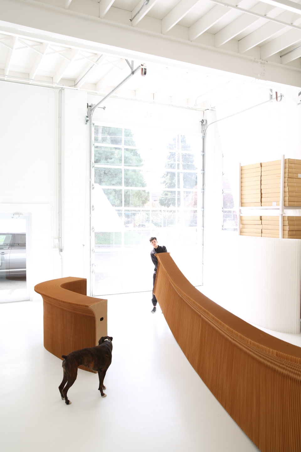 a man stretches the honeycomb bases of cantilever table