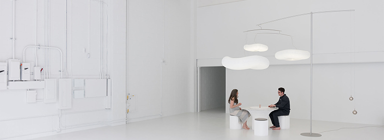 folding paper furniture under paper cloud lamp designed by Stephanie Forsythe and Todd MacAllen of molo.