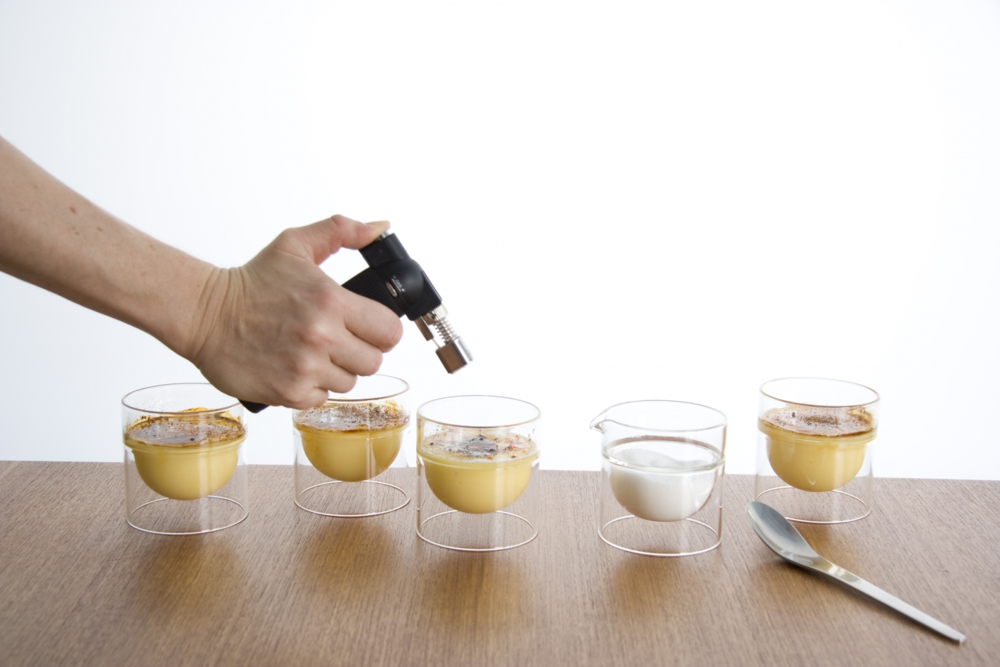 making creme brulee in float tea cups