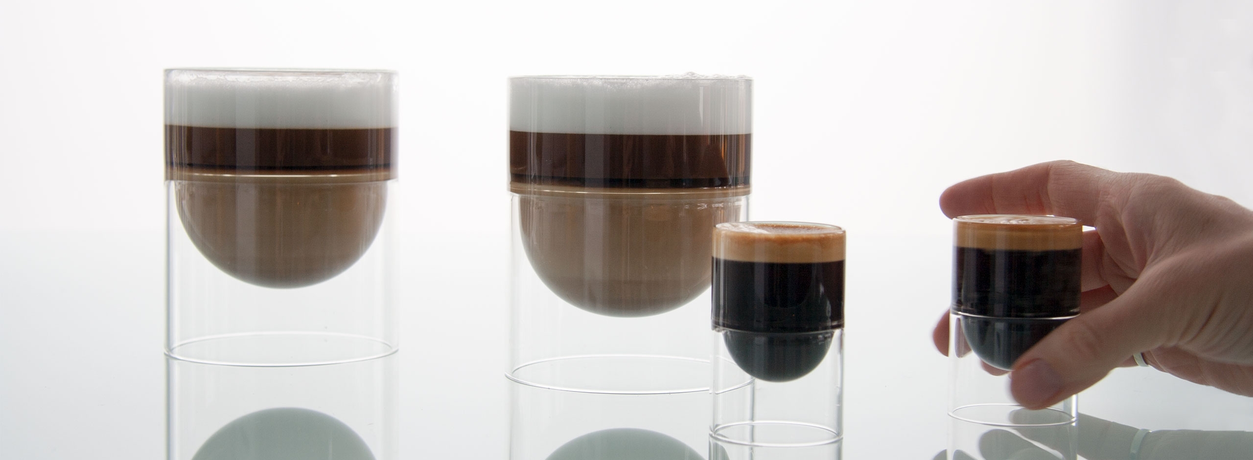 cappuccinos and espresso in float liqueur glasses / float tea cups