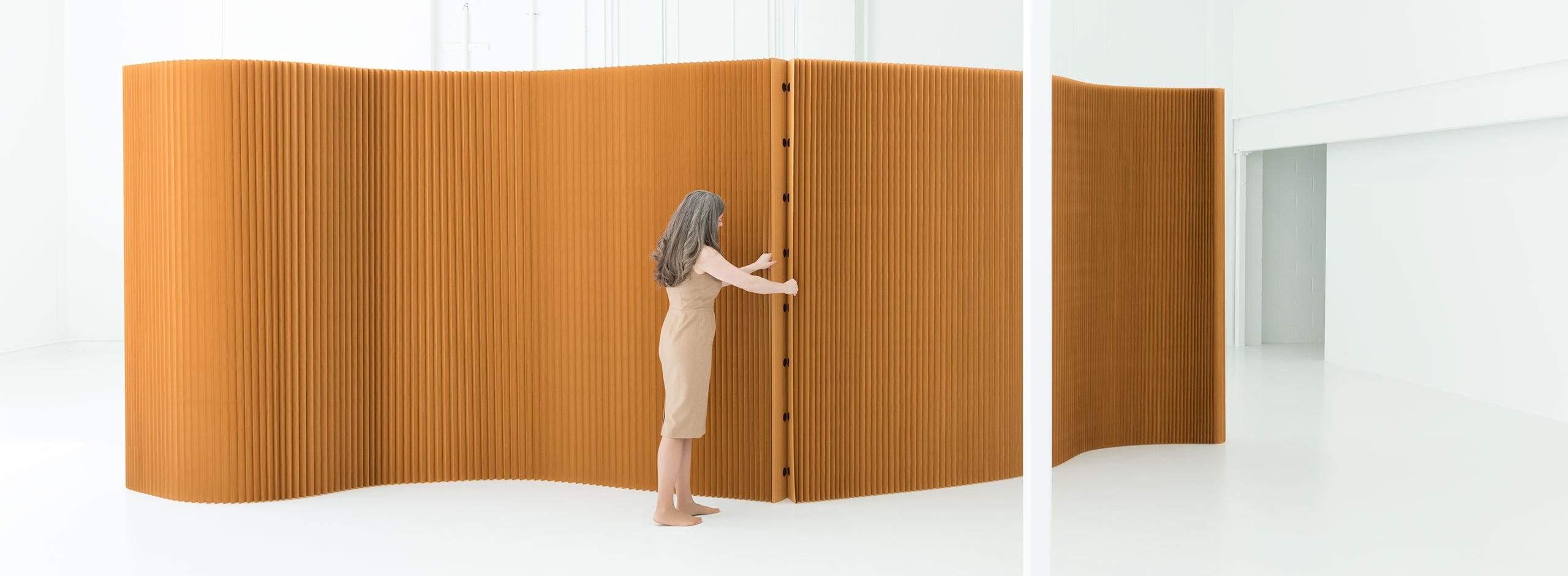 Using the magnetic end panels to create a modular partition system.