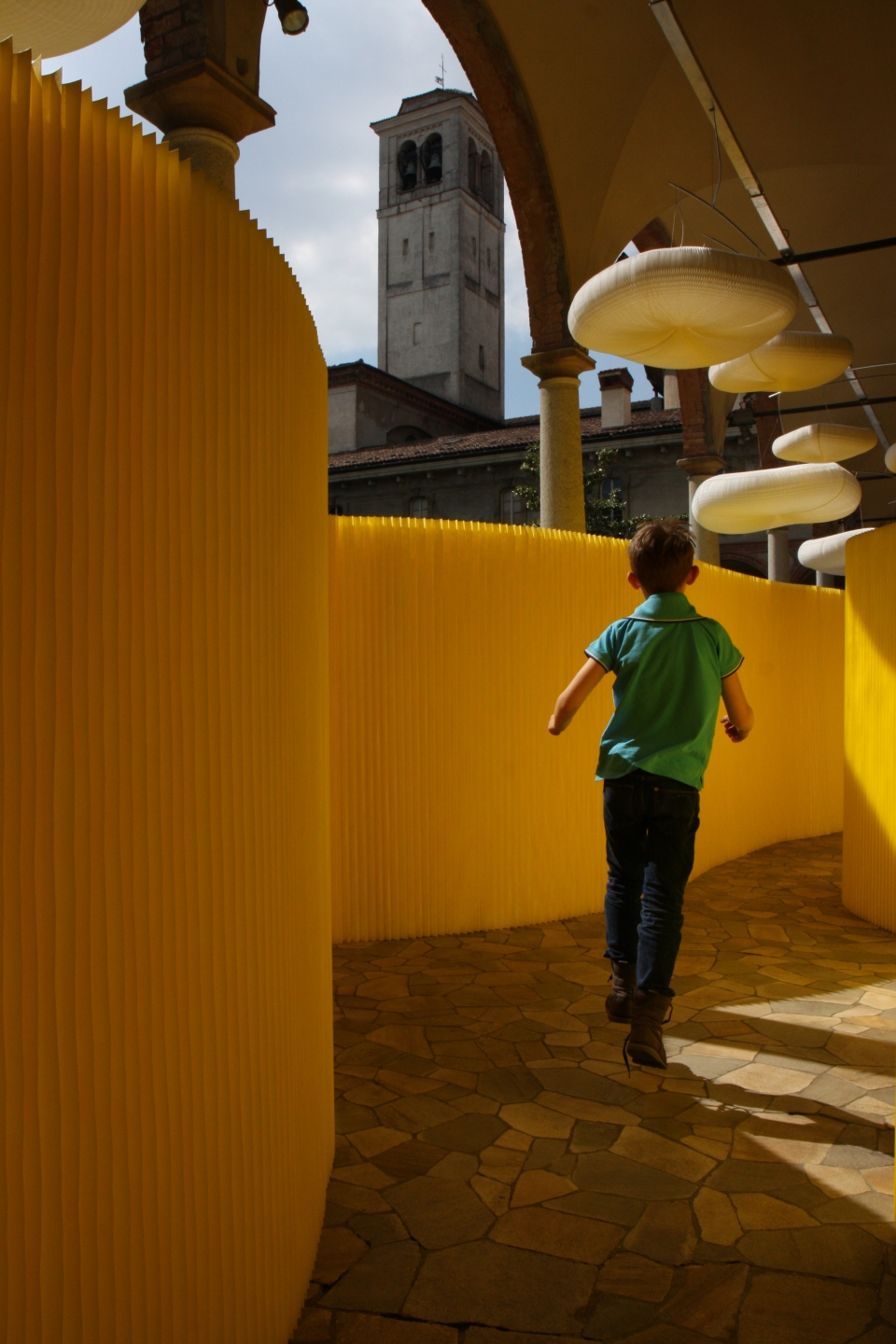room divider textile softwall in a custom yellow colour and cloud mobile softlight for MOST in Milan