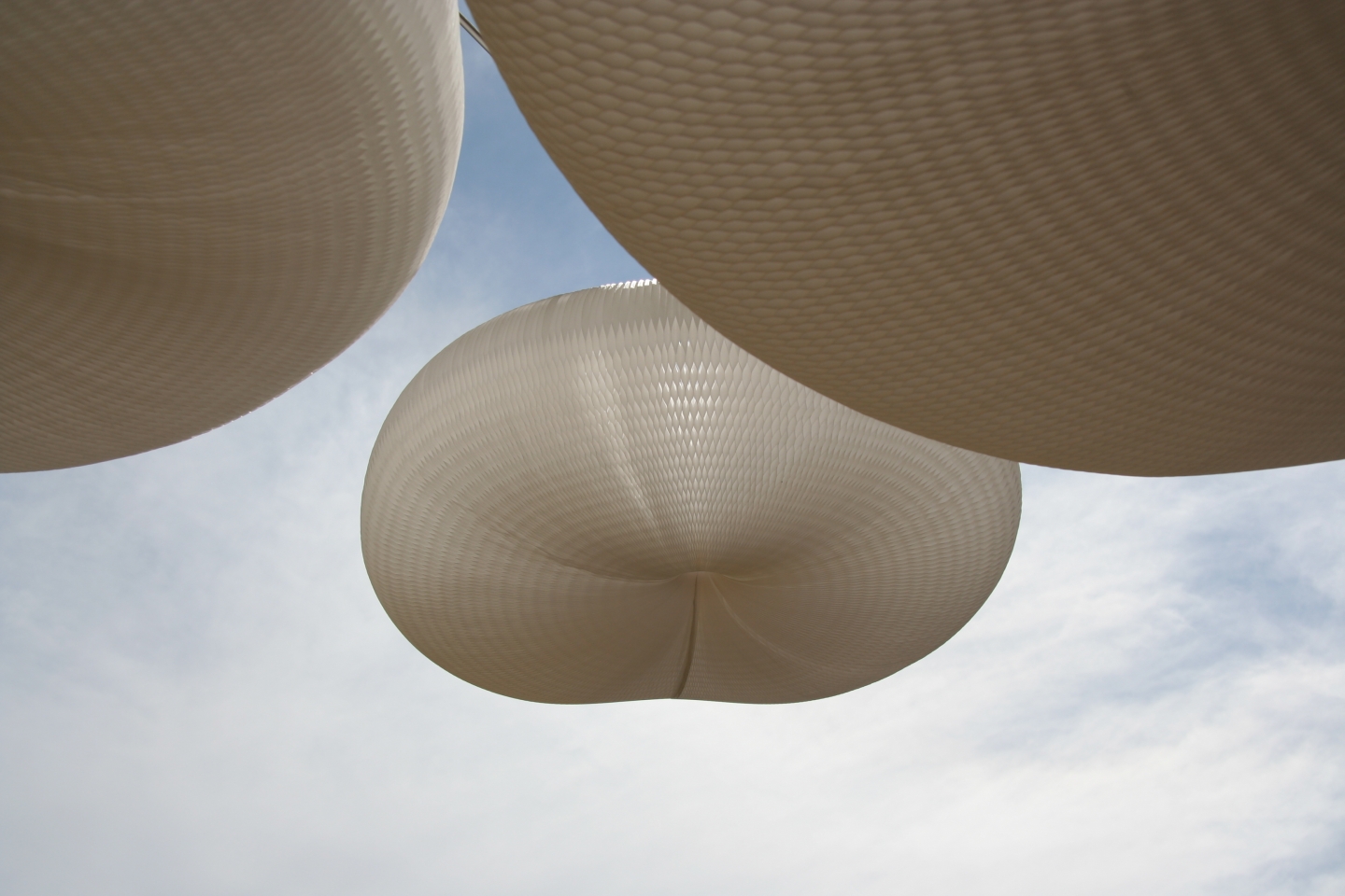against blue sky: cloud softlight mobile for MOST in Milan - modern paper lighting by molo