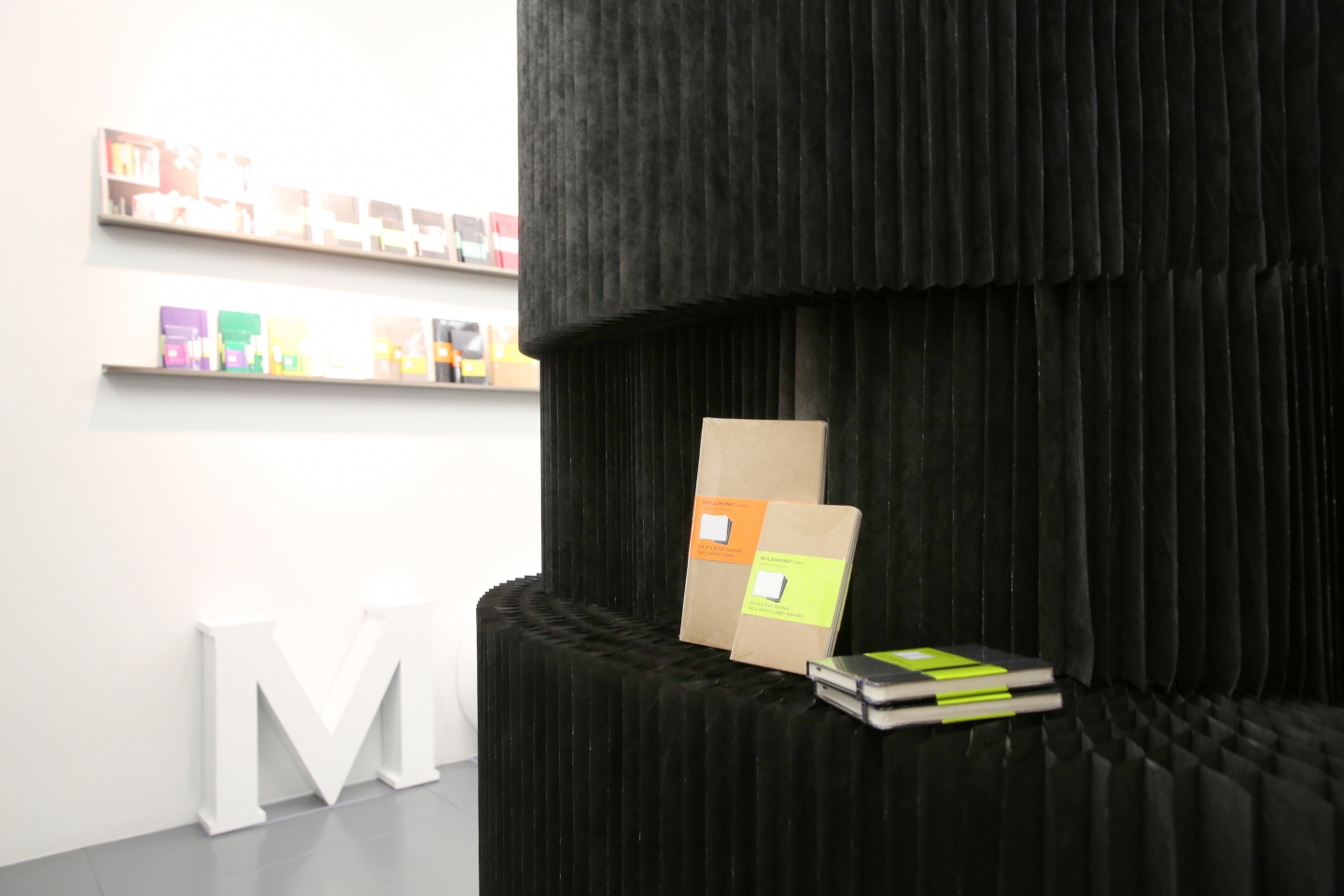 molo black textile softblocks and paper softseating at Moleskine offices in New York