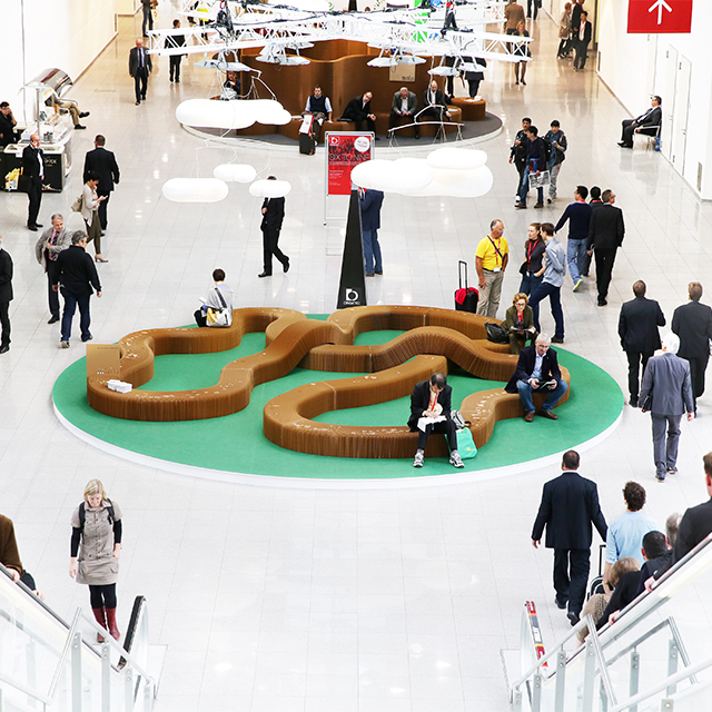 A serpentine bench, made from connected paper softseating, on display at Orgatec 2014.