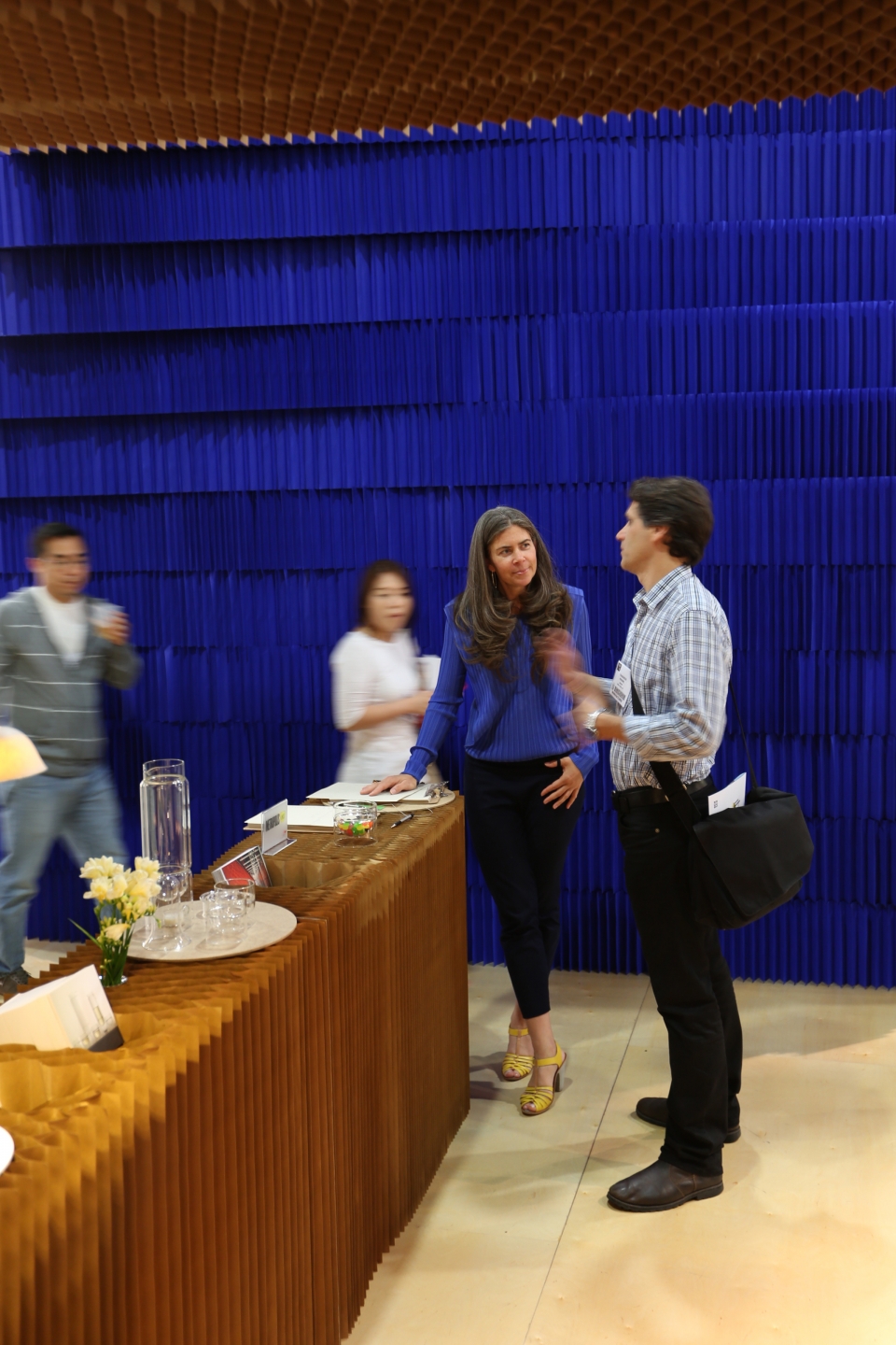 molo products on display in front of a wall of indigo softblocks - indigo paper softblock / modular room divider