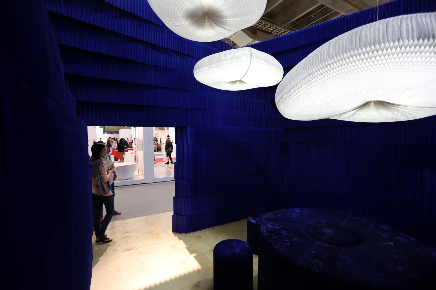 cloud softlight pendants inside the molo installation at ICFF 2012 - indigo paper softblock / modular room divider