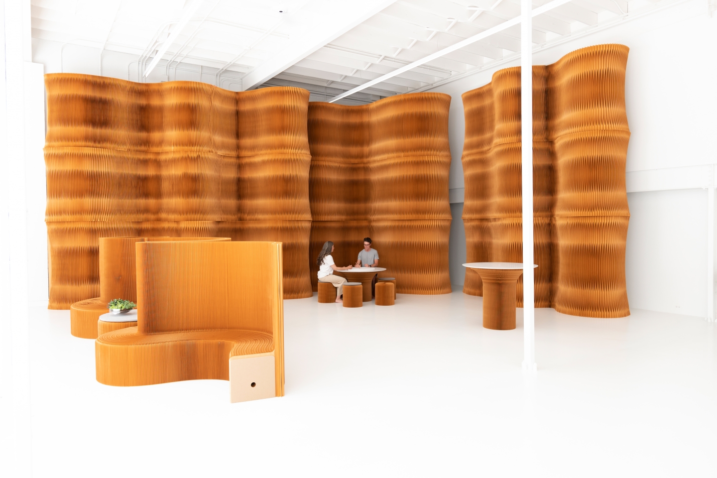 paper furniture exhibit at orgatec 2018 - molo's highbacked seating and paper softwall