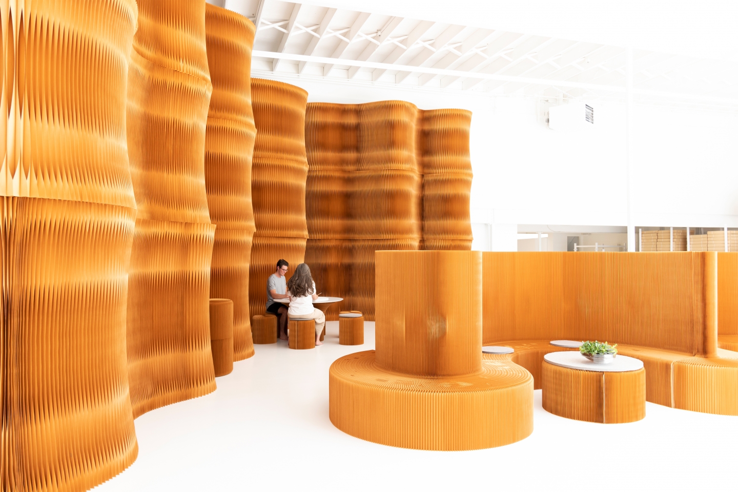 paper furniture exhibit at orgatec 2018 - molo's highbacked seating and paper softwall