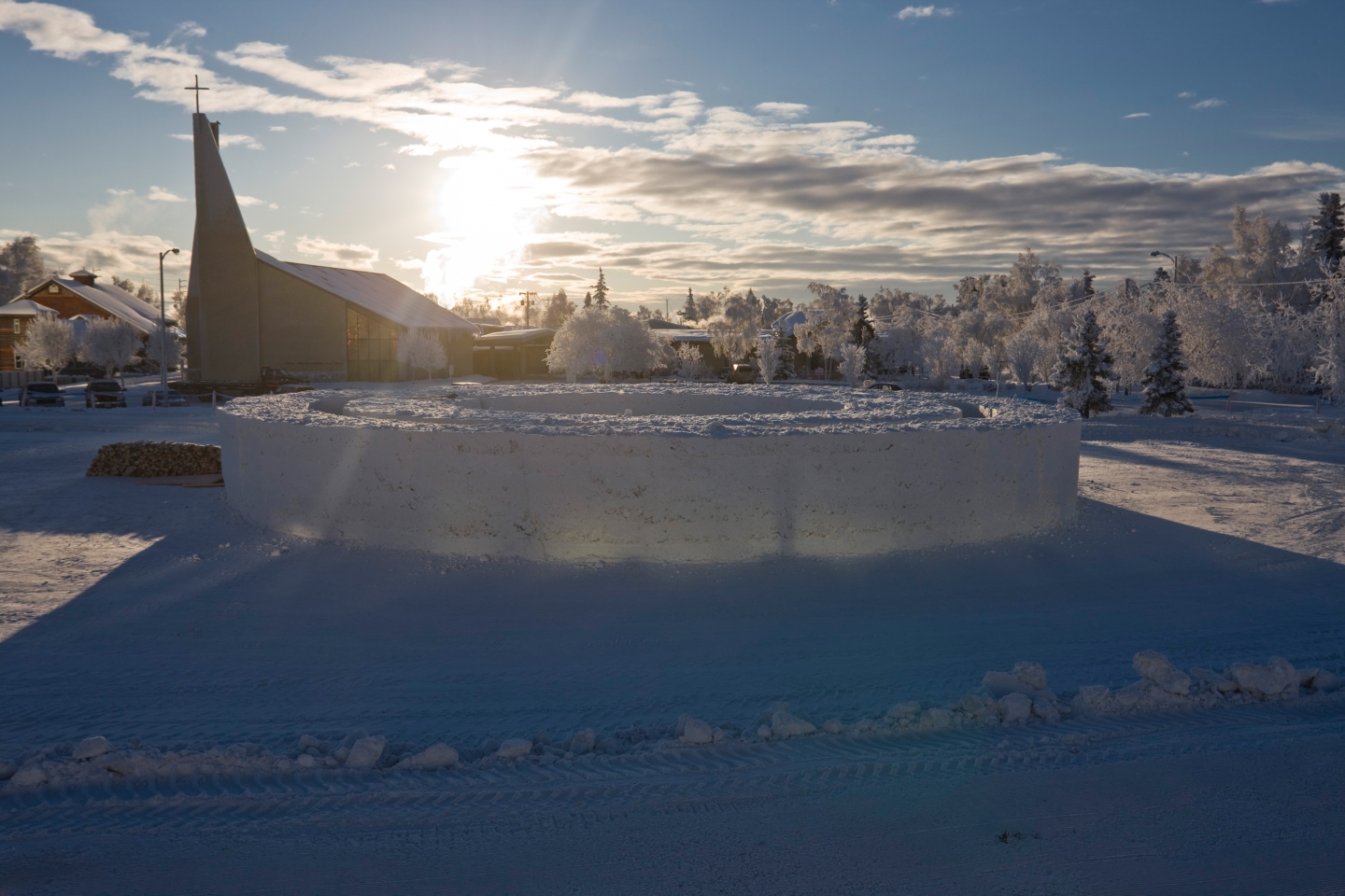 The alaskan sun sets over northern sky circle, a snow maze designed by Stephanie Forsythe + Todd MacAllen for FREEZE