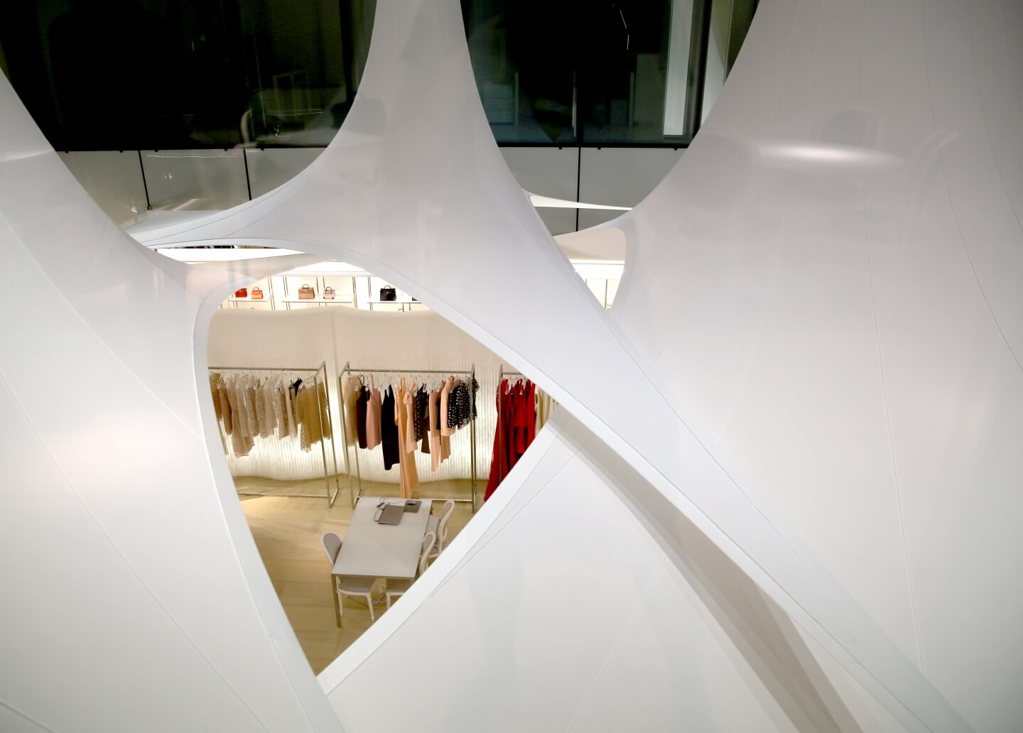 white fabric acoustic office wall dividers by molo - dior headquarters in paris
