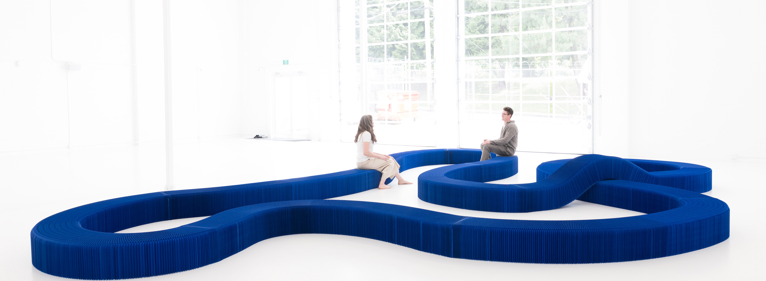 communal seating - indigo-blue-serpentine-bench